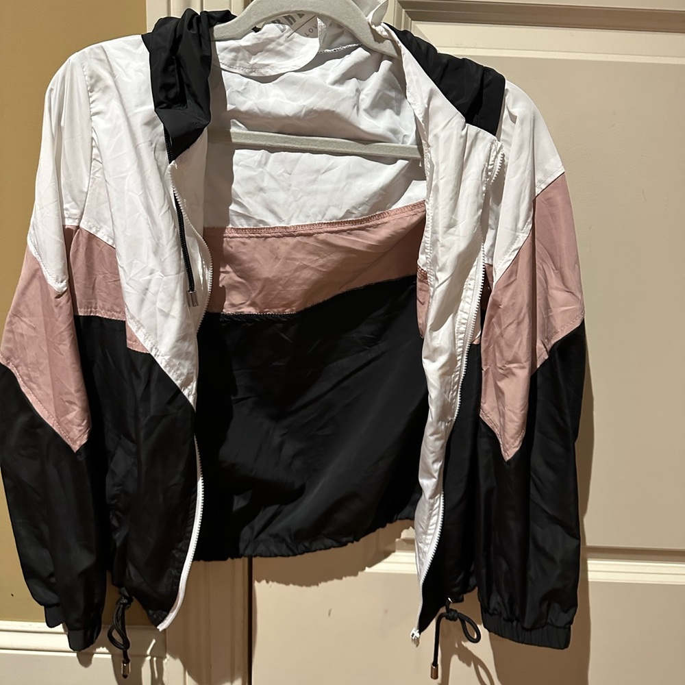 Love Tree wind breaker in black, white, and pink. Size medium